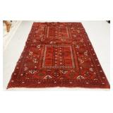 1261	DARK RED ORIENTAL AREA RUG5 FT 7 IN X 7 FT 7 IN. HAS GRAYING ON ONE EDGE