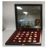 1269	25 PENDANTS OF THE WORLD