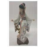 1283	LLADRO FIGURE ASIAN WOMAN HOLDING FLOWER, 10 3/4 IN H 