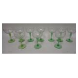 1286	10 ETCHED CHAMPAGNES W/ GREEN FLUTED STEMS, HAVE A MEDALLION OF A DANCING NUDE, 5 3/4 IN H ONE 