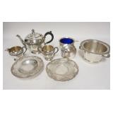 1300	SILVER PLATE LOT, INCLUDES TEA SET, HINGE ON POT NEEDS REPAIR, SUGAR BOWL W/COLBALT BLUE LINER,