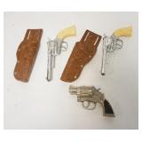 1310	3 CAP GUNS, PAIR OF PONY BOY W/LEATHER HOLSTERS & TROOPER, LARGEST IS 9 1/2 IN