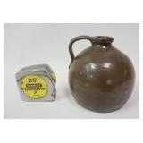 1025	SMALL BROWN JUG W/HANDLE, 6 IN HIGH