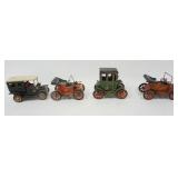 1050	GROUP OF 4 TIN LEVER WOUND JAPAN TOY CARS