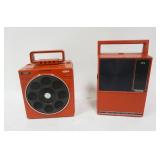 1111	LOT OF 2 VINTAGE 8 TRACK PORTABLE STEREO PLAYERS