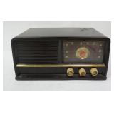 1118	ARVIN TABLE TOP AM/FM RADIO. 13 1/2 IN X 17 IN, 6 1/2 IN H 