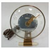 1186	TELECHRON BEDROOM CLOCK 7 1/4 IN H, HAS LOSS TO SILVER 