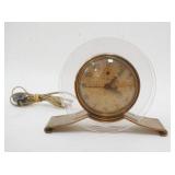 1197	GE ART DECO CLOCK, FOXING ON THE FACE, TINY NICK AT THE BASE ON THE LUCITE, 7 3/4 IN WIDE X 6 1