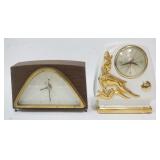 1209	2 MIDCENTURY MODERN CLOCKS, ONE CERAMIC-NO CORD, ONE WOOD-8 3/4 IN WIDE X 6 IN HIGH