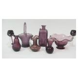 1221	8 PIECE OT OF AMETHYST GLASS, INCLUDES 2 CUT TO CLEAR CORDIALS, TALLEST IS 8 IN
