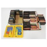 1250	LOT OF VINTAGE ATARI & TEXAS INSTURMENTS GAMES, INCLUDES PAC-MAN, DONKEY KONG, E.T., SPACE  INV