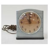 1261	GENERAL ELECTRIC ILLUMINATED ALARM CLOCK, 4 1/2 IN X 4 1/4 IN