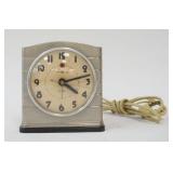 1262	GENERAL ELECTRIC ALARM CLOCK, 4 1/2 IN X 4 1/4 IN