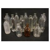 1270	13 OLD BABY BOTTLES, TALLEST IS 7 IN