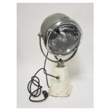 1309	RAY-LINE SEARCH LIGHT, HAS A MIRROR REFLECTOR, MODEL 41020 1104, 10 IN DIAMETER X 22 IN HIGH