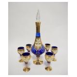 1035	ITALIAN BLOWN GLASS 7 PIECE CORDIAL SET, COBALT BLUE W/GOLD TRIM & APPLIED CERAMIC FLOWERS