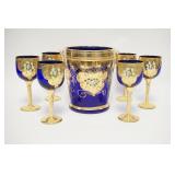 1036	7 PIECE ITALIAN BLOWN GLASS GOBLETS & ICE BUCKET, COBALT BLUE W/GOLD TRIM & APPLIED PORCELAIN, 