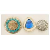 1183	2 PINS MARKED GURD ONE WITH BLUE STONE OTHER WITH TURQUOISE AND AZTEC MAYAN CALENDAR, 1.15 TOZ 