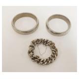 1192	3 BRACELETS, ONE MARKED EITHER 920 OR 820, 2 STRETCH BRACELETS WITH METAL CIRCLE INSIDE, MARK W