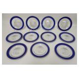 1217	11 GLASS PLATES W/BLUE & GOLD BORDERS, 7 5/8 IN