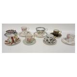 1233	GROUP OF 8 DECORATED CUP & SAUCER SETS