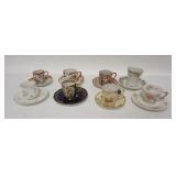 1234	GROUP OF 8 DECORATED CUP & SAUCER SETS