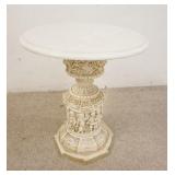 1323	STONE TOP STAND W/FIGURES AROUND THE BASE, 18 IN DIAMETER X 20 1/2 IN HIGH