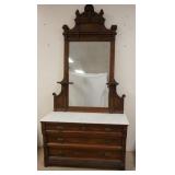 1361	CARVED HIGH BACK MARBLE TOP DRESSER W/ MIRROR. 89 1/2 IN H, 45 1/2 IN W