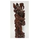 1022	LARGE ASIAN WOOD CARVING OF MAN CLINGING TO TREE, MISSING TOP FINIAL, 24 IN HIGH