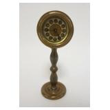 1025	ANTIQUE MINIATURE BRASS DESK CLOCK ON PEDISTAL BASE, 7 IN HIGH