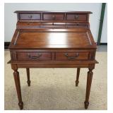 1042	INLAID SLANT FRONT DESK W/FLUTED LEGS, HAS 7 DRAWERS & INTERIOR DRAWERS, 36 IN WIDE X 45 1/4 IN