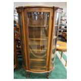 1046	CURVED GLASS OAK CHINA CABINET W/CLAW FEET, DOOR ALSO HAS CURVED GLASS, CORINTIAN HALF COLUMNS,