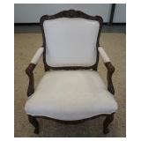 1051	CARVED UPHOLSTERED ARM CHAIR, 29 IN WIDE X 39 IN HIGH