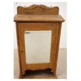 1076	OAK MEDICINE CABINET, MIRROR DOOR, COMPARTMENTALIZED INTERIOR, 26 IN HIGH X 17 IN WIDE X 7 1/2 