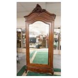 1113	VICTORIAN CARVED MIRROR DOOR ARMIORE, HAS AN ARCHED TOP, BEVELED MIRROR, LEAF & SCROLL CARVED C