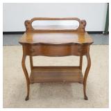 1120	TIGER OAK MIRROR BACK SERVER, MIRROR IS BEVELED, SERPENTINE FRONT, HAS A BOTTOM SHELF, 36 IN WI