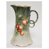 1139	CFH, GPM LIMOGES PITCHER W/HAND PAINTED FRUIT, UNUSUAL LOOPED HANDLE, 8 3/4 IN HIGH