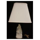 1202	FIGURAL PARIAN LAMP ON A BRASS BASE, WOMAN & DOVE, SOME CHIPS ON THE FLOWERS & LEAVES, 29 1/2 I