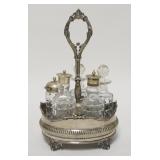 1239	5 BOTTLE VICTORIAN CASTOR SET SILVERPLATED HOLDER, BOTTLES ARE CUT & ALL MATCHED, 11 1/4 IN HIG