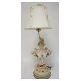 1242	PORCELAIN BUST OF LADY MOUNTED AS A LAMP, HAS CLOTH SHADE W/TASSELS, HAND PAINTED, COUPLE OF SM