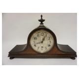 1262	MILLER GERMANY MANTLE CLOCK W/WESTMINSTER CHIMES, HAS TURNED FINIAL & FEET, CARVED TRIM, 21 1/2