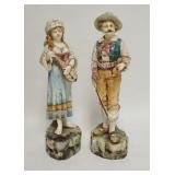 1286	PAIR OF PORCELAIN FIGURES, IMPRESSED UNDER GLAZE NUMBERS, WOMANS INSTRUMENT IS DAMAGED, BOTH AR