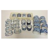 1297	3 SETS OF BLUE DECORATED NAPKIN RINGS, 8 TO A SET, ONE IS DANSK