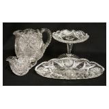 1306	4 PIECE AMERICAN BRILLIAN CUT GLASS, PITCHER IS 6 3/4 IN HIGH, HAS A CRACK IN THE HANDLE, OTHER