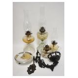 1309	4 ANTIQUE KEROSENE LAMPS, INCLUDES BRACKET LAMP W/REFLECTOR, TALLEST IS 20 3/4 IN