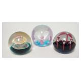 1030	3 CAITHNESS INTERNALLY DECORATED PAPERWEIGHTS, LARGEST IS 5 IN