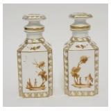 1031	2 HAND PAINTED SPANISH PORCELAIN COLOGNE BOTTLES, 7 IN HIGH
