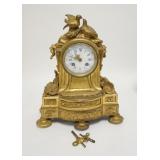 1119	VICTORIAN BRONZE CLOCK W/STRIKE, FEATURES MUSICAL INSTRUMENTS, HELMETS, LOVE BIRDS, FACE MARKED