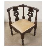 1131	CARVED CORNER CHAIR W/LION HEAD ARMS & FACE IN THE CENTER, 18 IN WIDE X 29 1/2 IN HIGH