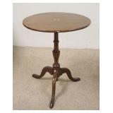 1147	INLAID TILT TOP SANKE FOOT CANDLE STAND, SOME LOSS TO INLAY, CHIP AT TOP OF ONE LEG, HAS CIGARE
